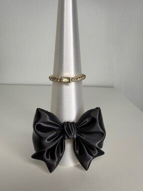 Gold Toned Ring with green center stone and CZ size 8